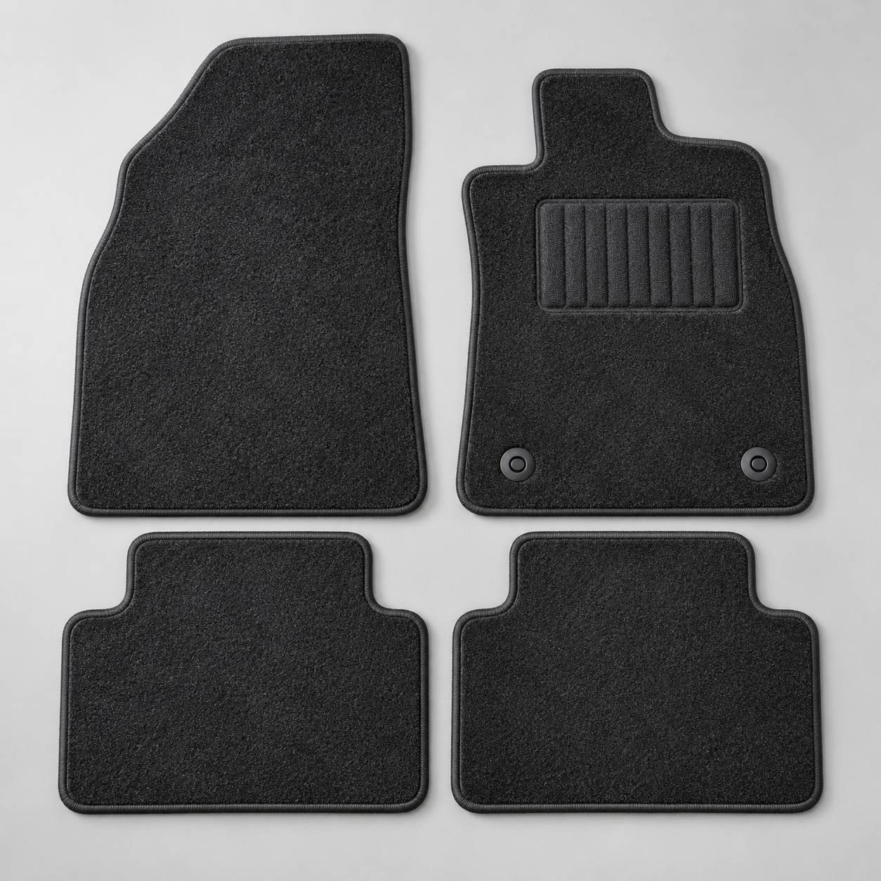 Four piece carpet mat set laid out flat